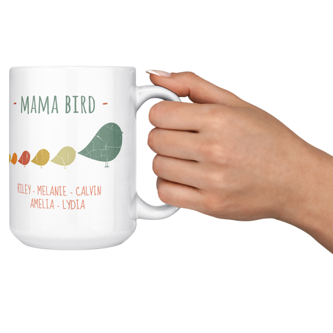 Image of Mama_Bird_with_5_Birdies_15oz_Mug_15ozWhiteMugLifestyleRHCheers_Mockup.png_15900387