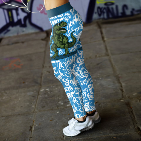 Image of Surfing Leggings T-Rex Surfing With Surf Text