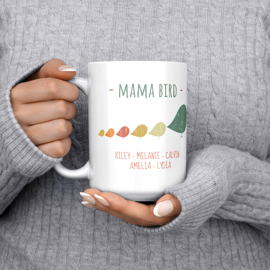 Mama_Bird_with_5_Birdies_15oz_Mug_15ozWhiteMugLifestyleLHChest_Mockup.png_15900385