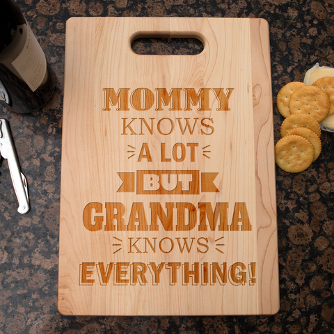 Image of Mommy Knows a Lot but Grandma Knows Everything Personalized Maple Cutting Board
